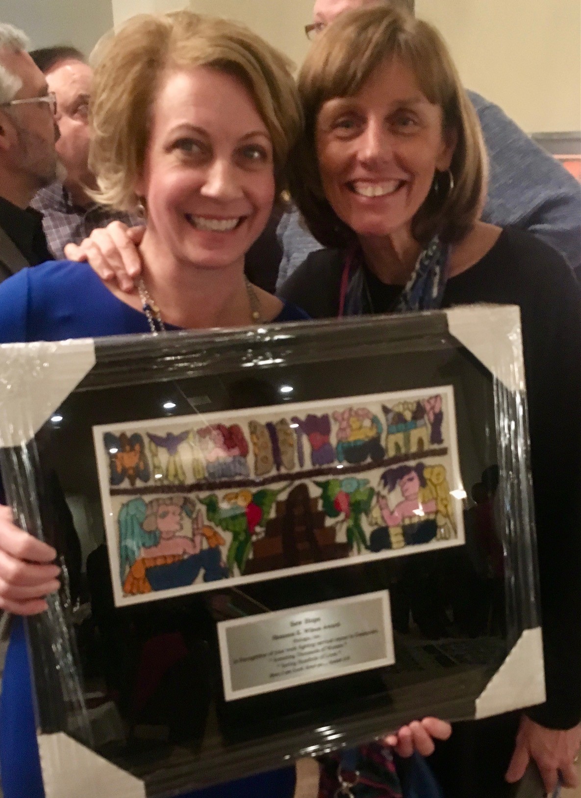 Rhonda Blue and Dr. Anne Ruch with plaque recognizing Hologic support for SewHope.