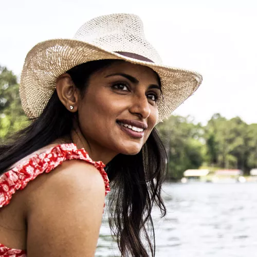 Photo of woman outside on a boat.